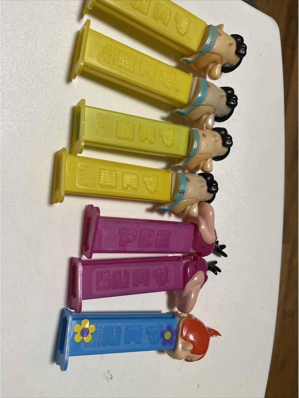 lot of 7, 1992 flinstone candy dispencers